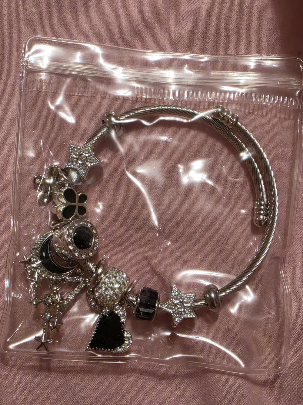 Silver Charm Bracelet with Black Accents